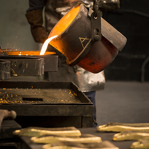 Pouring gold at The Perth Mint refinery.
