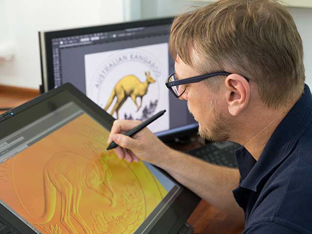 An artist in the coining division at The Perth Mint. 