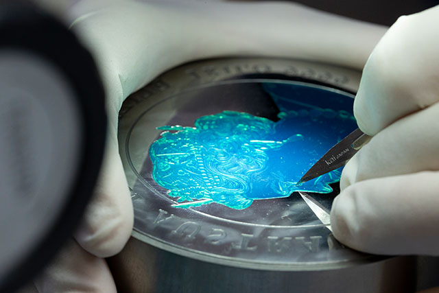 Manufacturing a coin featuring Queen Elizabeth II at The Perth Mint. 