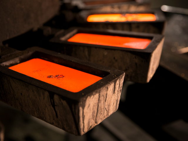 The Perth Mint refinery team pouring molten gold
