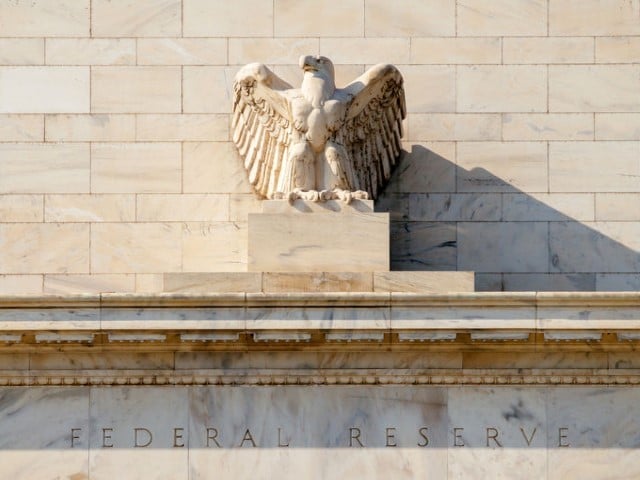 federal reserve building with statue of a bald eagle