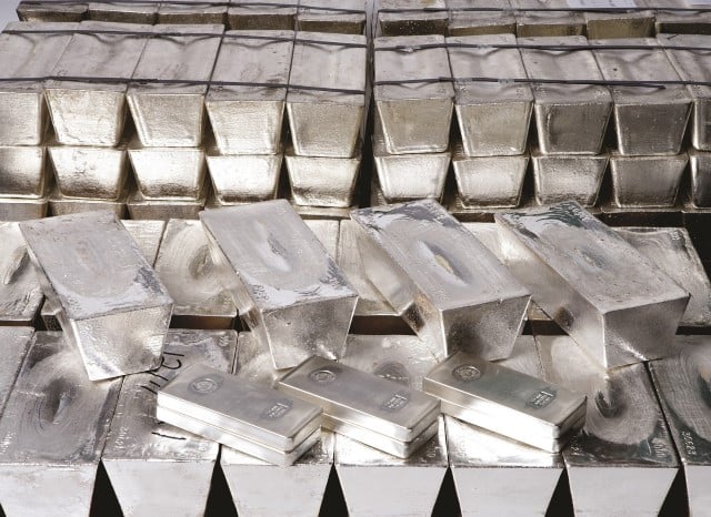 a stack of various sized Perth Mint silver bullion bars